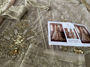 Faiza Saqlain golden white bridal wedding edition