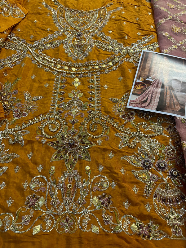 Mohsin Naveed Ranjha rust bridal collection