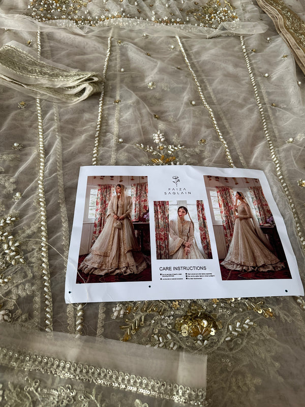 Faiza Saqlain golden white bridal wedding edition
