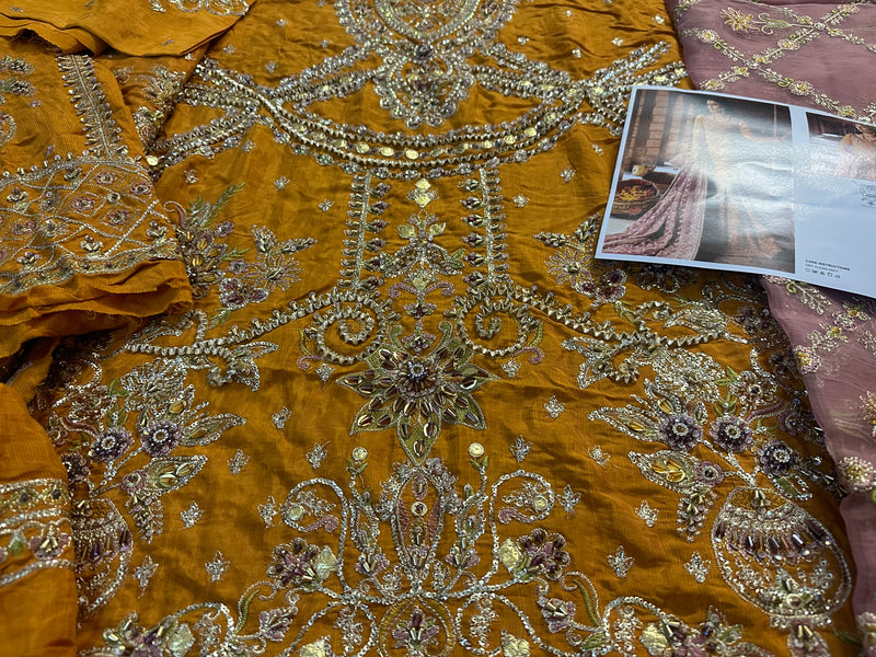 Mohsin Naveed Ranjha rust bridal collection