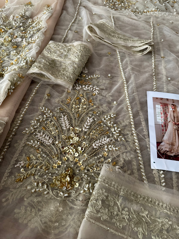 Faiza Saqlain golden white bridal wedding edition