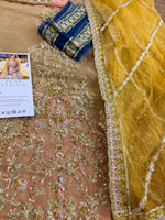 Faiza Saqlain yellow pink wedding edition