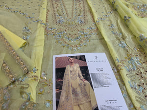 Faiza saqlain yellow lawn 2025