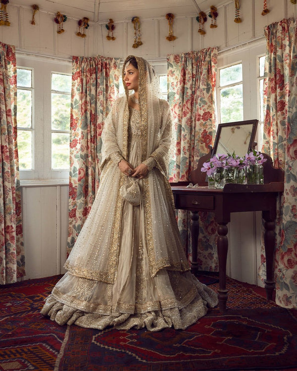 Faiza Saqlain golden white bridal wedding edition