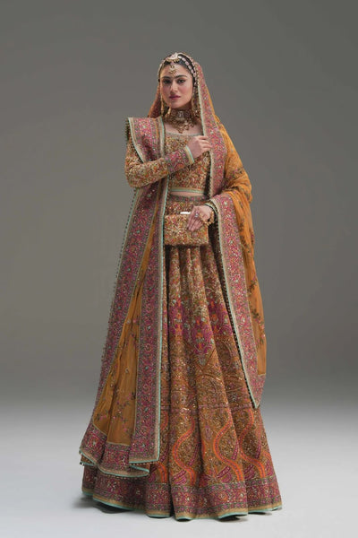 Fahad Hussain mustard yellow coture